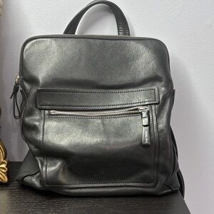 The Trend Black Pebbled Leather Backpack with Front Zip Pocket